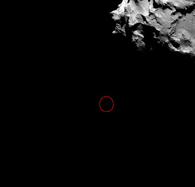 Una de las nuevas imágenes que también se han publicado este jueves. En este caso, del descenso de la sonda 'Philae' (en el círculo). La instantánea corresponde a las 14.19 GMT (una hora más en España, hora peninsular). Tomó tierra a las 16.03 GMT.